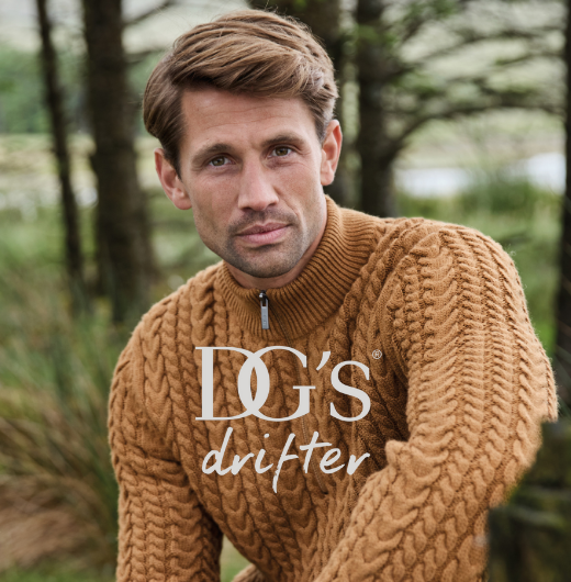 Man in brown taupe knitted quarter zip